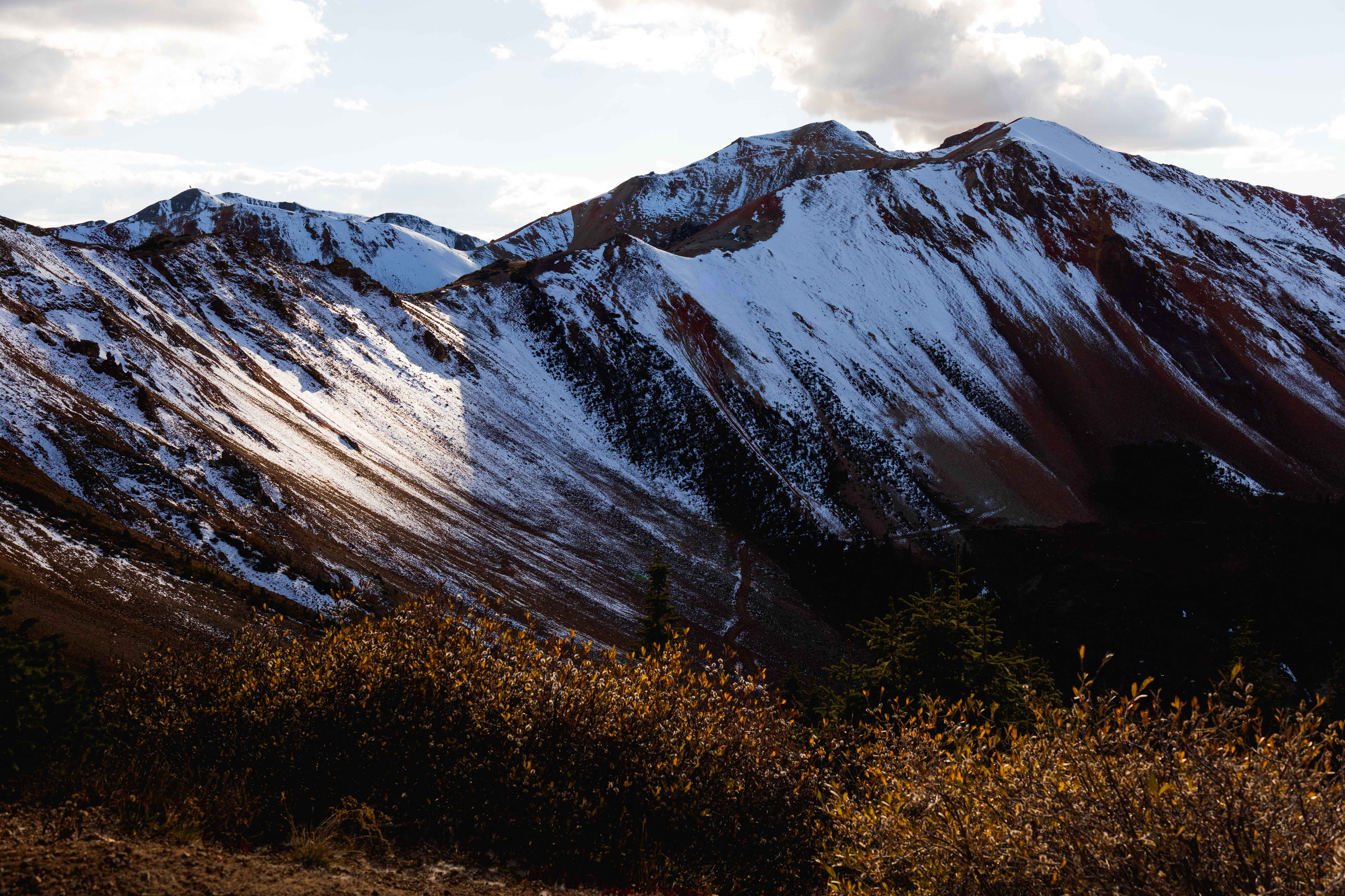 red mountains covered in snow